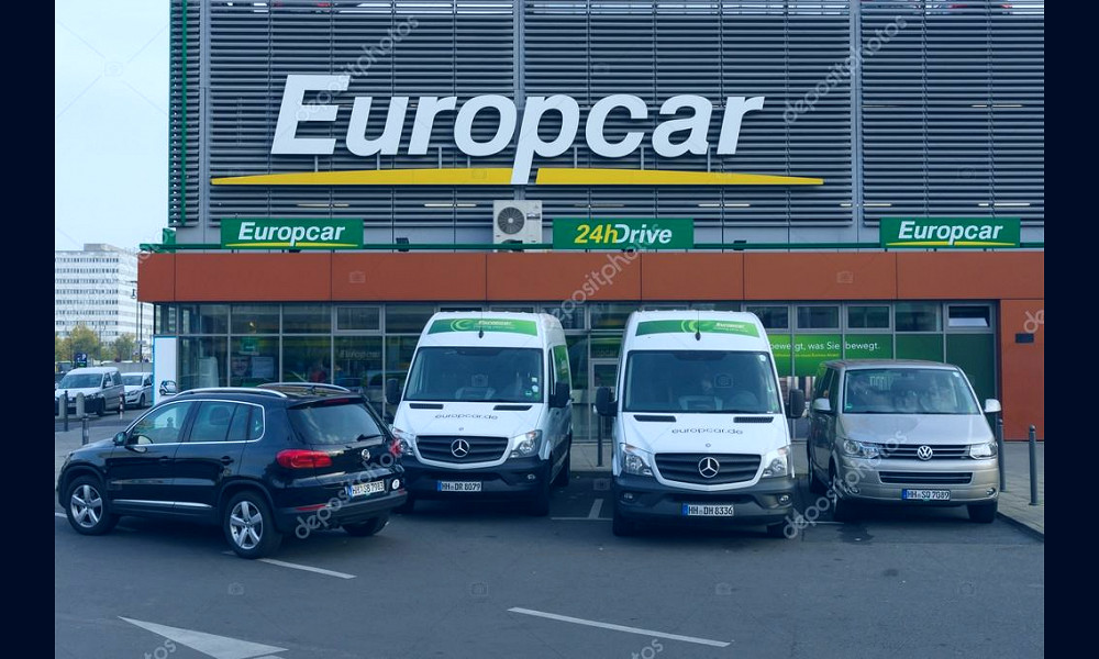 Europcar is a car rental company owned by Eurazeo. Europcar today operates  a fleet of over 200,000 vehicles at 2,825 locations in 143 different  countries – Stock Editorial Photo © S_Kohl #57023927