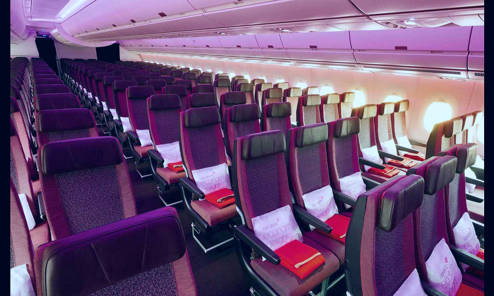 Virgin Atlantic's New Plane Has an Onboard Lounge That's the 'Largest  Social Space in the Sky'